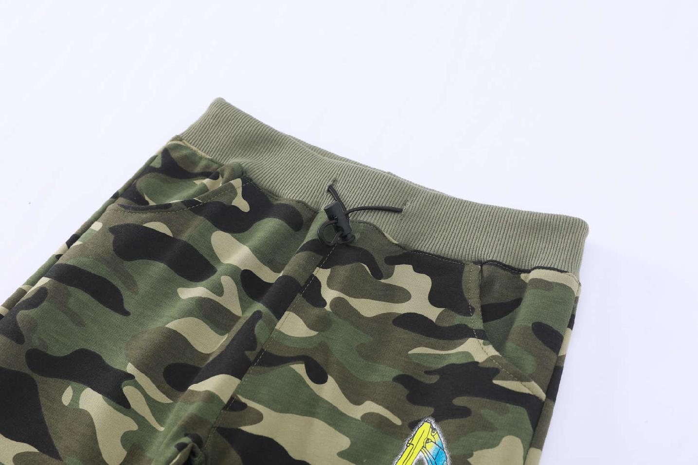 Chlapecké maskáčové tepláky Kugo ST8826 zelené